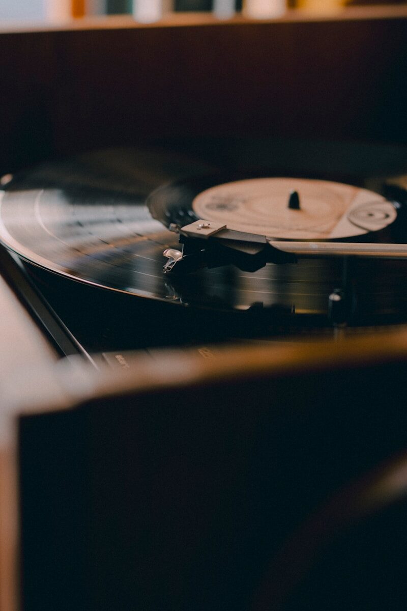 Close-up of a vinyl record playing on a turntable.